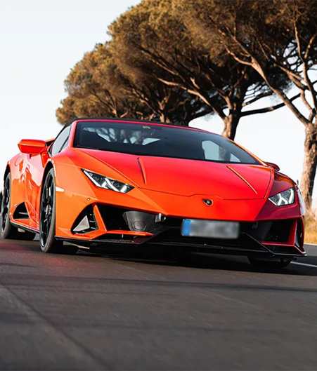 Luxury Lamborghini Huracán Evo Spider Orange Car Rental in Porto